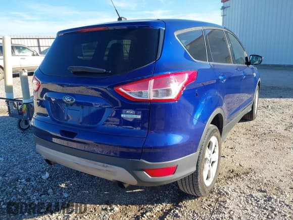 ✅ 2014 Ford Escape SE • VIN: 1FMCU0GX3EUB22948 • Lot: 43574267. Listed on IAAI with 77,798 mi. Free auction sales archive from the USA and detailed vehicle history report at DreamBid. Image 4.