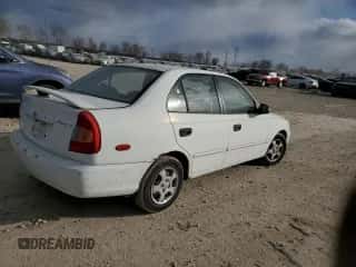 2001 Hyundai Accent GL with VIN KMHCG45C51U156558, listed as a Copart auction lot 89369295 with 61,945 mi miles and Clean title. Bid and sale history available at DreamBid. Image 3.
