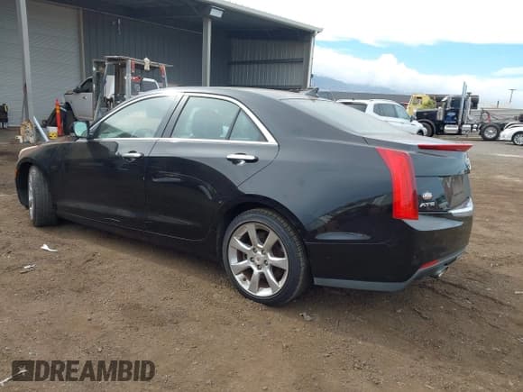 ✅ 2014 Cadillac ATS Luxury RWD • VIN: 1G6AB5RX6E0104935 • Lot: 43486915. Listed on IAAI with 74,216 mi. Free auction sales archive from the USA and detailed vehicle history report at DreamBid. Image 3.
