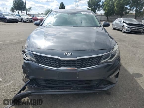 ✅ 2020 Kia Optima LX • VIN: 5XXGT4L36LG391581 • Лот: 82392805. Опубликован ранее на Copart с пробегом 67 640 миль. Бесплатный доступ к архиву аукционных продаж из США и подробный отчёт об истории автомобиля на DreamBid. Изображение 5.