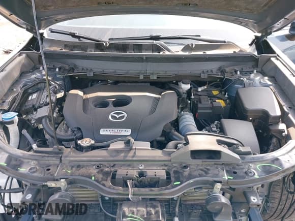 ✅ 2022 Mazda CX-9 Carbon Edition • VIN: JM3TCBDY7N0622769 • Lot: 42918869. Wystawiony na IAAI z przebiegiem 20 120 mil. Bezpłatny archiwum sprzedaży aukcyjnych z USA i szczegółowy raport historii pojazdu na DreamBid. Zdjęcie 10.