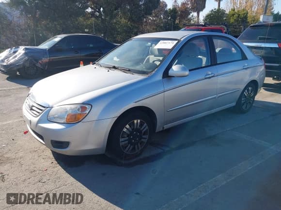 ✅ 2008 Kia Spectra EX • VIN: KNAFE121885556317 • Lot: 43887174. Listed on IAAI with 163,165 mi. Free auction sales archive from the USA and detailed vehicle history report at DreamBid. Image 2.