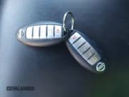 ✅ 2015 Nissan Pathfinder Platinum • VIN: 5N1AR2MM6FC659335 • Lot: 43595159. Listed on IAAI with 133,529 mi. Free auction sales archive from the USA and detailed vehicle history report at DreamBid. Image 11.