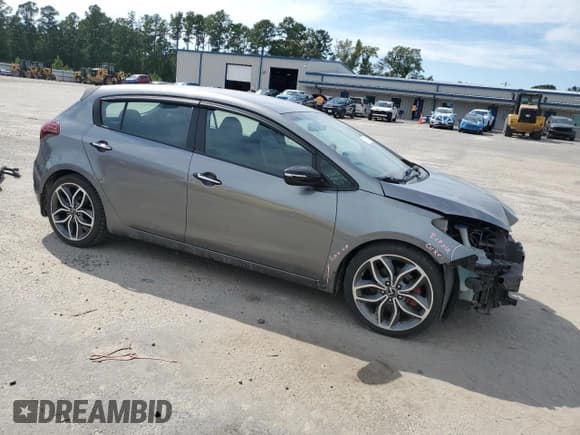 ✅ 2015 Kia Forte SX • VIN: KNAFZ5A37F5265187 • Lot: 71542025. Listed on Copart with 128,894 mi. Free auction sales archive from the USA and detailed vehicle history report at DreamBid. Image 4.