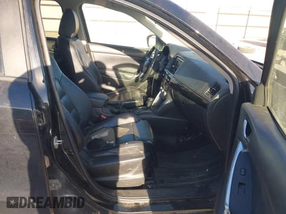 ✅ 2014 Mazda CX-5 Grand Touring • VIN: JM3KE2DY7E0345255 • Lot: 43668720. Listed on IAAI with 270,412 mi. Free auction sales archive from the USA and detailed vehicle history report at DreamBid. Image 5.