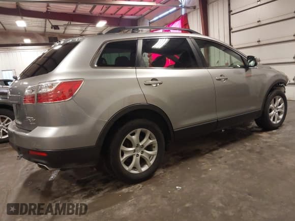 ✅ 2012 Mazda CX-9 Touring • VIN: JM3TB3CV3C0350685 • Lot: 42714426. Listed on IAAI with 145,873 mi. Free auction sales archive from the USA and detailed vehicle history report at DreamBid. Image 4.