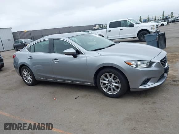 ✅ 2014 Mazda 6 i Sport • VIN: JM1GJ1U60E1135741 • Lot: 42452826. Wystawiony na IAAI z przebiegiem 140 243 mil. Bezpłatny archiwum sprzedaży aukcyjnych z USA i szczegółowy raport historii pojazdu na DreamBid. Zdjęcie 13.