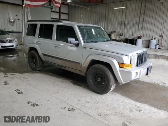 ✅ 2008 Jeep Commander Sport • VIN: 1J8HG48K48C108118 • Lot: 52482685. Listed on Copart with 212,000 mi. Free auction sales archive from the USA and detailed vehicle history report at DreamBid. Image 4.