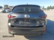 ✅ 2022 Mazda CX-5 S Premium • VIN: JM3KFBDMXN1543266 • Лот: 86109205. Опубликован ранее на Copart с пробегом 64 226 миль. Бесплатный доступ к архиву аукционных продаж из США и подробный отчёт об истории автомобиля на DreamBid. Изображение 6.