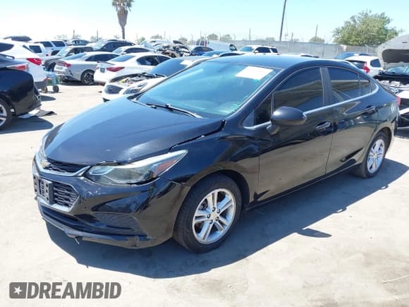 ✅ 2017 Chevrolet Cruze LT • VIN: 1G1BE5SM7H7223302 • Lot: 42669467. Listed on IAAI with 159,330 mi. Free auction sales archive from the USA and detailed vehicle history report at DreamBid. Image 2.