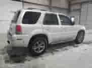 2007 Mercury Mariner Premier с VIN 4M2CU971X7KJ11281, выставлен на аукционе Copart как лот 70717105 с пробегом 149 938 миль миль и Списание • Salvage title. История ставок и продаж доступна на DreamBid. Изображение 3.
