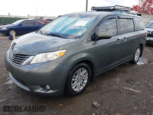 ✅ 2014 Toyota Sienna XLE • VIN: 5TDYK3DCXES436166 • Lot: 43661250. Listed on IAAI with 119,504 mi. Free auction sales archive from the USA and detailed vehicle history report at DreamBid. Image 2.