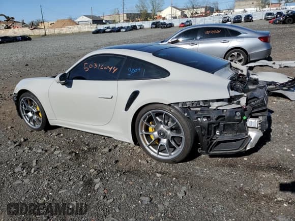 ✅ 2021 Porsche 911 Turbo S • VIN: WP0AD2A9XMS257789 • Лот: 50316044. Опубликован ранее на Copart с пробегом Не указан. Бесплатный доступ к архиву аукционных продаж из США и подробный отчёт об истории автомобиля на DreamBid. Изображение 2.