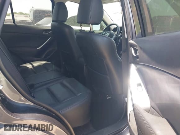 ✅ 2016 Mazda CX-5 Grand Touring • VIN: JM3KE2DY1G0692633 • Лот: 42327766. Опубликован ранее на IAAI с пробегом 128 050 миль. Бесплатный доступ к архиву аукционных продаж из США и подробный отчёт об истории автомобиля на DreamBid. Изображение 8.