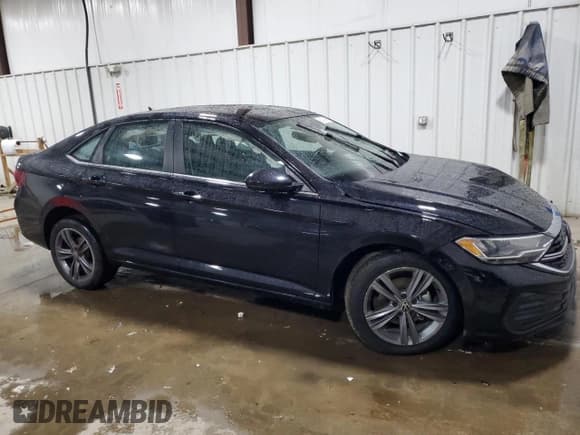 ✅ 2024 Volkswagen Jetta SE • VIN: 3VW7M7BU2RM096684 • Lot: 90370365. Listed on Copart with 27,808 mi. Free auction sales archive from the USA and detailed vehicle history report at DreamBid. Image 4.