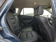 ✅ 2016 Mazda CX-5 Grand Touring • VIN: JM3KE2DYXG0895715 • Лот: 89669845. Опубликован ранее на Copart с пробегом 116 438 миль. Бесплатный доступ к архиву аукционных продаж из США и подробный отчёт об истории автомобиля на DreamBid. Изображение 11.