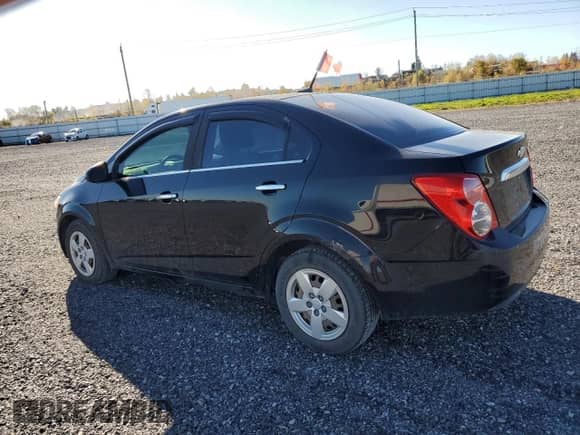 2012 Chevrolet Sonic LT с VIN 1G1JC5EHXC4204379, выставлен на аукционе Copart как лот 90040615 с пробегом 186 920 миль миль и Списание • Salvage title. История ставок и продаж доступна на DreamBid. Изображение 2.