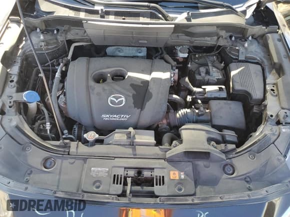 ✅ 2018 Mazda CX-5 Touring • VIN: JM3KFACM0J0310119 • Lot: 87260445. Wystawiony na Copart z przebiegiem 137 160 mil. Bezpłatny archiwum sprzedaży aukcyjnych z USA i szczegółowy raport historii pojazdu na DreamBid. Zdjęcie 12.