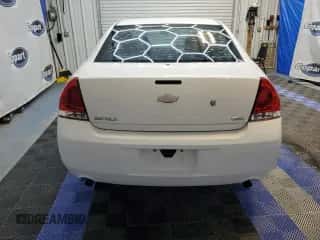 2014 Chevrolet Impala Police Police with VIN 2G1WD5E34E1183499, listed as a Copart auction lot 63675565 with 128,644 mi miles and Clean title. Bid and sale history available at DreamBid. Image 6.