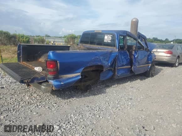 1997 Dodge 1500 with VIN 3B7HC13Z0VG721576, listed as a Copart auction lot 63650144 with 233,852 mi miles and Salvage title. Bid and sale history available at DreamBid. Image 3.