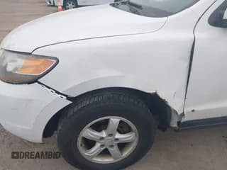 ✅ 2007 Hyundai Santa Fe GLS • VIN: 5NMSG73D67H051170 • Лот: 43541650. Опубликован ранее на IAAI с пробегом 221 112 миль. Бесплатный доступ к архиву аукционных продаж из США и подробный отчёт об истории автомобиля на DreamBid. Изображение 6.