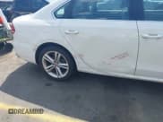 ✅ 2014 Volkswagen Passat SE • VIN: 1VWBS7A35EC088504 • Лот: 42312048. Опубликован ранее на IAAI с пробегом 98 057 миль. Бесплатный доступ к архиву аукционных продаж из США и подробный отчёт об истории автомобиля на DreamBid. Изображение 6.