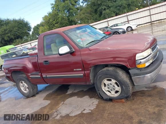 2002 Chevrolet Silverado 1500 LS z VIN 1GCEK14V02Z331249, wystawiony jako IAAI lot #42352384 z przebiegiem 232 697 mil mil oraz . Historia ofert i sprzedaży dostępna na DreamBid. Obrazek 13.