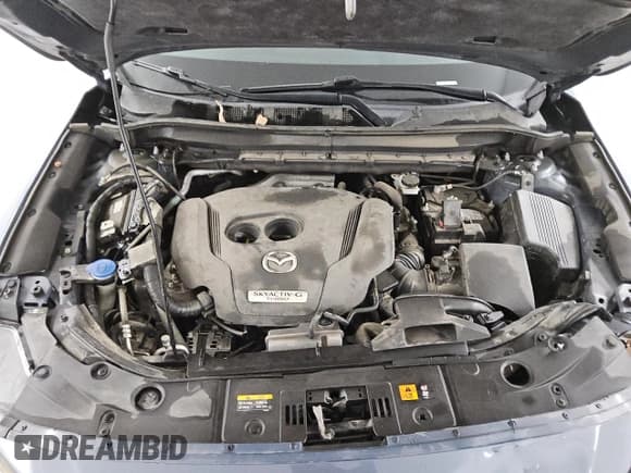 ✅ 2021 Mazda CX-5 Carbon Edition • VIN: JM3KFACY6M0410510 • Lot: 58585435. Listed on Copart with 56,319 mi. Free auction sales archive from the USA and detailed vehicle history report at DreamBid. Image 12.