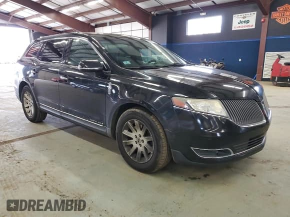 ✅ 2014 Lincoln MKT • VIN: 2LMHJ5NK7EBL51677 • Лот: 50523575. Опубликован ранее на Copart с пробегом 156 262 миль. Бесплатный доступ к архиву аукционных продаж из США и подробный отчёт об истории автомобиля на DreamBid. Изображение 4.