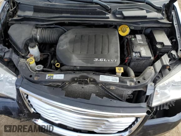 ✅ 2014 Chrysler Town & Country Touring • VIN: 2C4RC1BG7ER309959 • Лот: 52982415. Опубликован ранее на Copart с пробегом 104 189 миль. Бесплатный доступ к архиву аукционных продаж из США и подробный отчёт об истории автомобиля на DreamBid. Изображение 14.