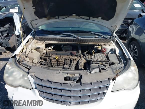 ✅ 2008 Chrysler Sebring LX • VIN: 1C3LC46K38N155827 • Лот: 43638904. Опубликован ранее на IAAI с пробегом 228 219 миль. Бесплатный доступ к архиву аукционных продаж из США и подробный отчёт об истории автомобиля на DreamBid. Изображение 10.