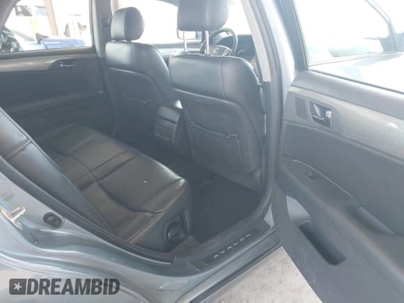 ✅ 2007 Toyota Avalon XL • VIN: 4T1BK36B17U197997 • Лот: 43111249. Опубликован ранее на IAAI с пробегом 303 478 миль. Бесплатный доступ к архиву аукционных продаж из США и подробный отчёт об истории автомобиля на DreamBid. Изображение 8.