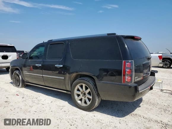✅ 2011 GMC Yukon XL Denali • VIN: 1GKS1MEFXBR299963 • Lot: 67390285. Listed on Copart with 295,610 mi. Free auction sales archive from the USA and detailed vehicle history report at DreamBid. Image 2.