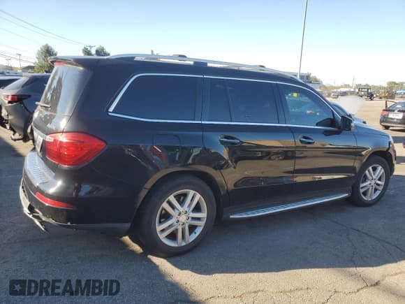 ✅ 2013 Mercedes-Benz GL 450 • VIN: 4JGDF7CE4DA171832 • Лот: 85695665. Опубликован ранее на Copart с пробегом 149 135 миль. Бесплатный доступ к архиву аукционных продаж из США и подробный отчёт об истории автомобиля на DreamBid. Изображение 3.