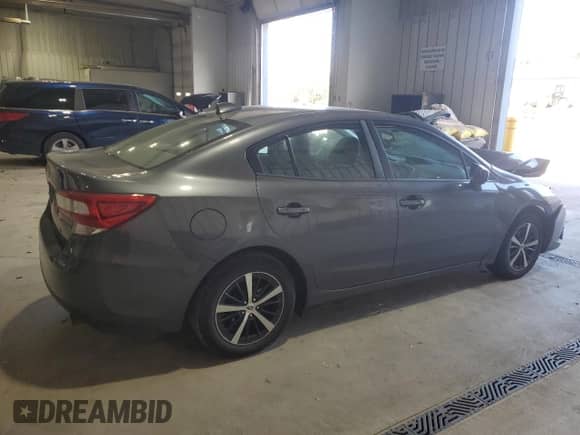 2023 Subaru Impreza Premium z VIN 4S3GKAV60P3600909, wystawiony jako Copart lot #87221065 z przebiegiem 26 936 mil mil oraz Szkoda całkowita • Salvage title. Historia ofert i sprzedaży dostępna na DreamBid. Obrazek 3.