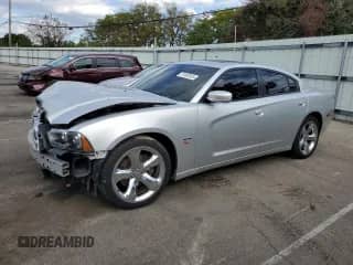 2012 Dodge Charger RT Plus with VIN 2C3CDXCT5CH120770, listed as a Copart auction lot 81982655 with 198,253 mi miles and Salvage title. Bid and sale history available at DreamBid. Image 1.