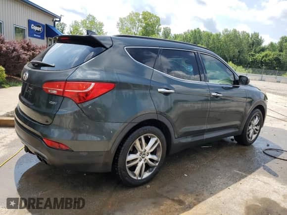 2013 Hyundai Santa Fe Sport z VIN 5XYZU3LAXDG067609, wystawiony jako Copart lot #65290195 z przebiegiem 198 057 mil mil oraz Szkoda całkowita • Salvage title. Historia ofert i sprzedaży dostępna na DreamBid. Obrazek 3.