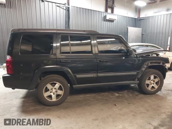 ✅ 2009 Jeep Commander Sport • VIN: 1J8HG48K09C547110 • Lot: 41768609. Listed on IAAI with 200,402 mi. Free auction sales archive from the USA and detailed vehicle history report at DreamBid. Image 14.