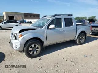 ✅ 2012 Nissan Frontier Pro-4X • VIN: 1N6AD0EV3CC405900 • Lot: 63515115. Listed on Copart with 61,015 mi. Free auction sales archive from the USA and detailed vehicle history report at DreamBid. Image 1.