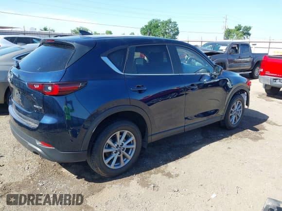 ✅ 2023 Mazda CX-5 S Carbon Edition • VIN: JM3KFBCM2P0250701 • Lot: 42272818. Listed on IAAI with 11,949 mi. Free auction sales archive from the USA and detailed vehicle history report at DreamBid. Image 4.