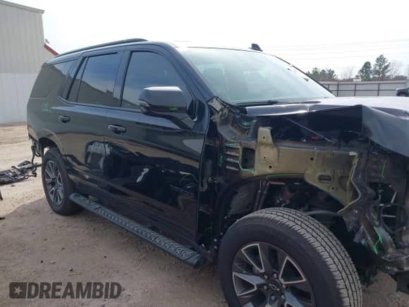 2022 Chevrolet Tahoe Z71 z VIN 1GNSKPKD4NR193050, wystawiony jako IAAI lot #41656544 z przebiegiem 41 165 mil mil oraz . Historia ofert i sprzedaży dostępna na DreamBid. Obrazek 14.