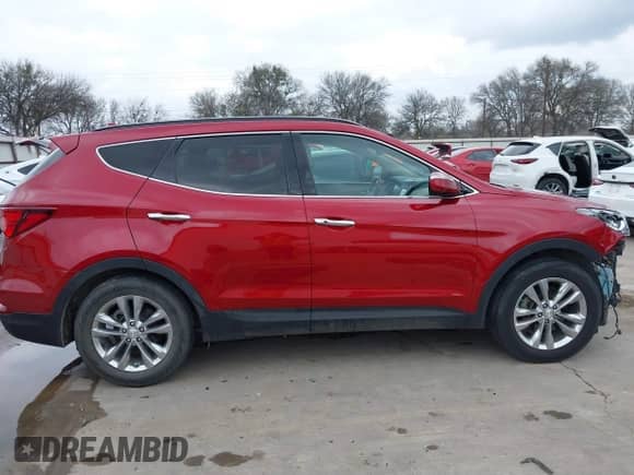 2017 Hyundai Santa Fe 2.0T z VIN 5XYZU4LA6HG409438, wystawiony jako IAAI lot #41680534 z przebiegiem 84 035 mil mil oraz . Historia ofert i sprzedaży dostępna na DreamBid. Obrazek 14.