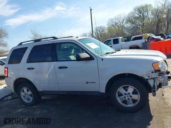 ✅ 2011 Ford Escape Hybrid • VIN: 1FMCU4K37BKC68370 • Lot: 41895193. Wystawiony na IAAI z przebiegiem 220 321 mil. Bezpłatny archiwum sprzedaży aukcyjnych z USA i szczegółowy raport historii pojazdu na DreamBid. Zdjęcie 14.