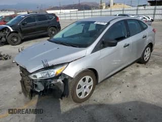 ✅ 2017 Ford Focus S • VIN: 1FADP3E21HL263932 • Лот: 80700175. Опубликован ранее на Copart с пробегом 59 441 миль. Бесплатный доступ к архиву аукционных продаж из США и подробный отчёт об истории автомобиля на DreamBid. Изображение 1.