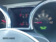 ✅ 2005 Ford Mustang GT Deluxe • VIN: 1ZVFT82HX55123301 • Lot: 43391120. Wystawiony na IAAI z przebiegiem 140 844 mil. Bezpłatny archiwum sprzedaży aukcyjnych z USA i szczegółowy raport historii pojazdu na DreamBid. Zdjęcie 7.