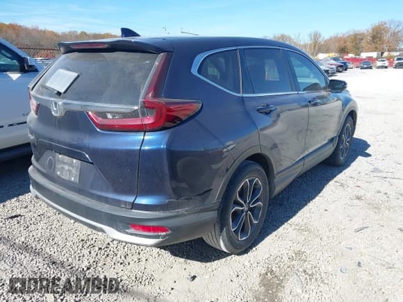 ✅ 2020 Honda CR-V EX-L • VIN: 2HKRW1H8XLH415825 • Lot: 43697303. Listed on IAAI with 128,863 mi. Free auction sales archive from the USA and detailed vehicle history report at DreamBid. Image 4.