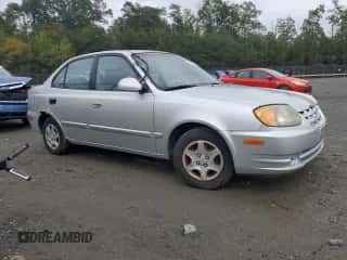 2005 Hyundai Accent GLS z VIN KMHCG45C25U636868, wystawiony jako Copart lot #82320125 z przebiegiem 136 913 mil mil oraz Szkoda całkowita • Salvage title. Historia ofert i sprzedaży dostępna na DreamBid. Obrazek 4.