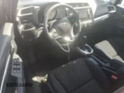 ✅ 2015 Honda Fit LX • VIN: 3HGGK5H57FM784187 • Lot: 64764785. Wystawiony na Copart z przebiegiem 47 661 mil. Bezpłatny archiwum sprzedaży aukcyjnych z USA i szczegółowy raport historii pojazdu na DreamBid. Zdjęcie 8.