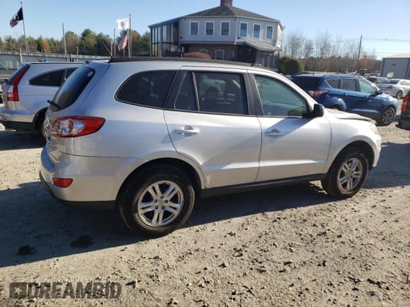 ✅ 2012 Hyundai Santa Fe GLS • VIN: 5XYZGDAB1CG162535 • Lot: 79842324. Listed on Copart with 174,959 mi. Free auction sales archive from the USA and detailed vehicle history report at DreamBid. Image 3.