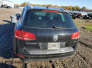 ✅ 2013 Volkswagen Touareg Sport • VIN: WVGEP9BP8DD004176 • Lot: 87032895. Listed on Copart with 169,033 mi. Free auction sales archive from the USA and detailed vehicle history report at DreamBid. Image 6.